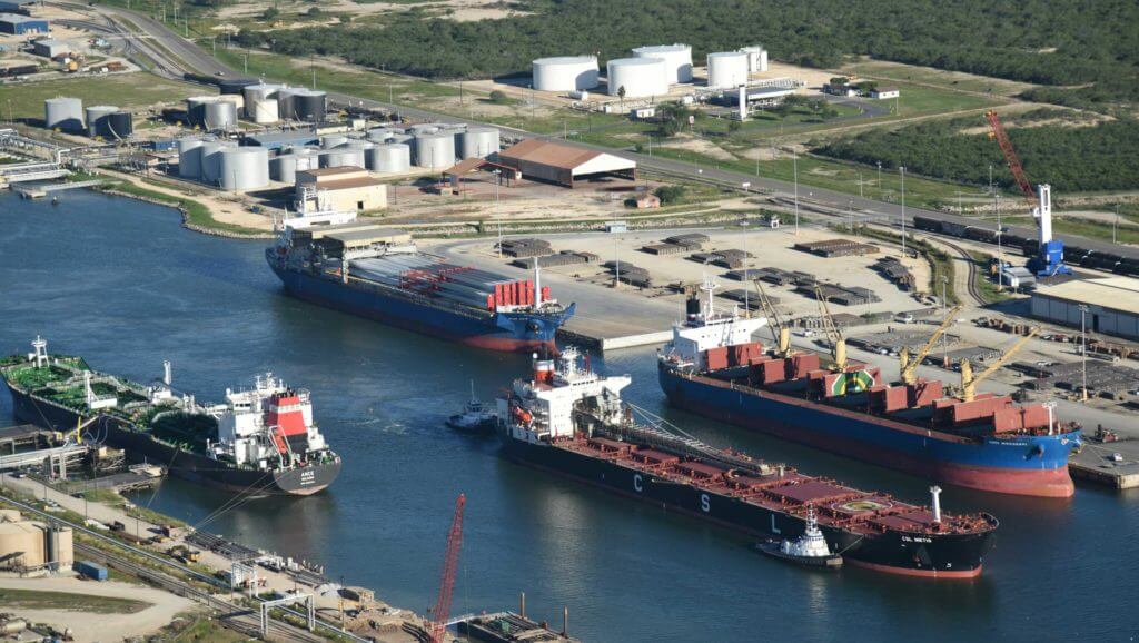 Ships pass through the channel in Port of Brownsville, Texas