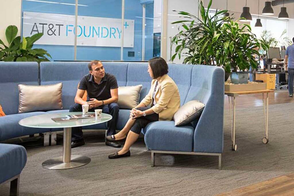 AT&T employees sit and have conversations at the AT&T Foundy Innovation Center in Plano, Texas.