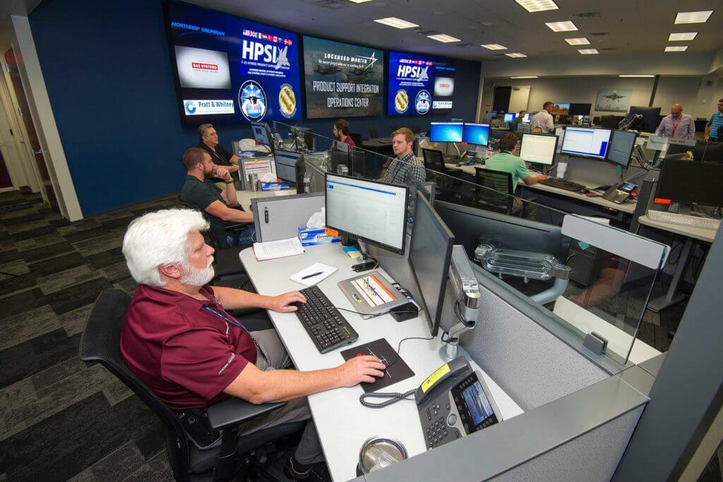 A man concentrates on a computer monitor while working at Lockheed Martin headquarters