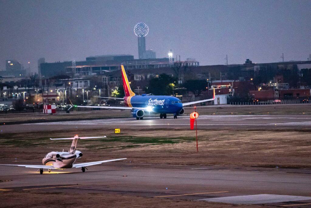 A Southwest plane lands on the tarmac