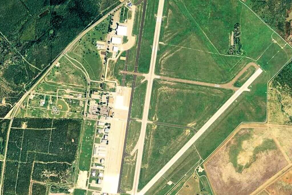 Aerial view of San Angelo Regional Airport, featuring large runways.