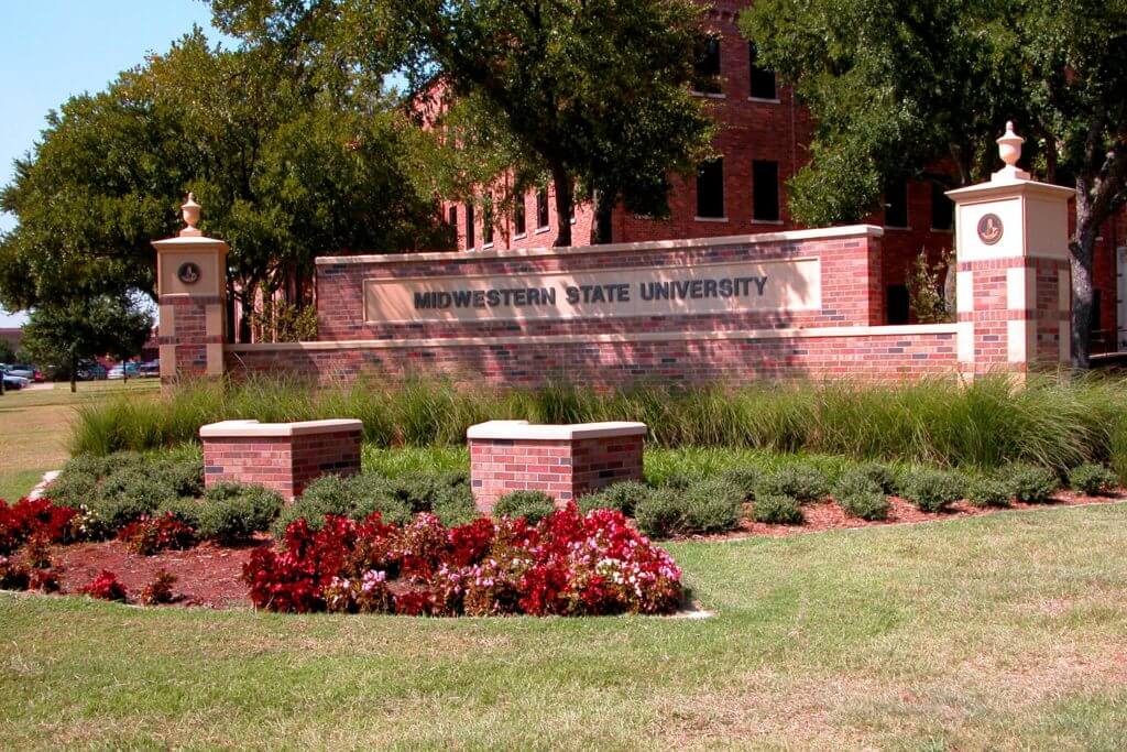 A large brick sign reads "Midwestern State University."