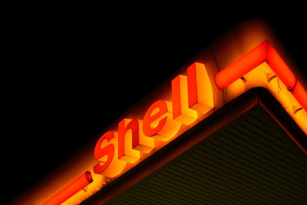 An illuminated Shell sign