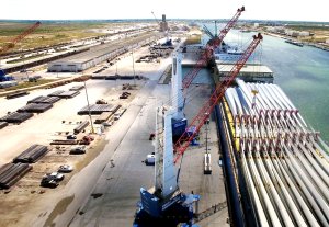 Port of Brownsville, Texas with cranes loading items on a barge