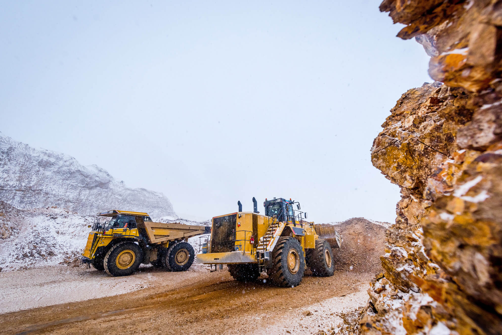 Excavators moving gold and minerals