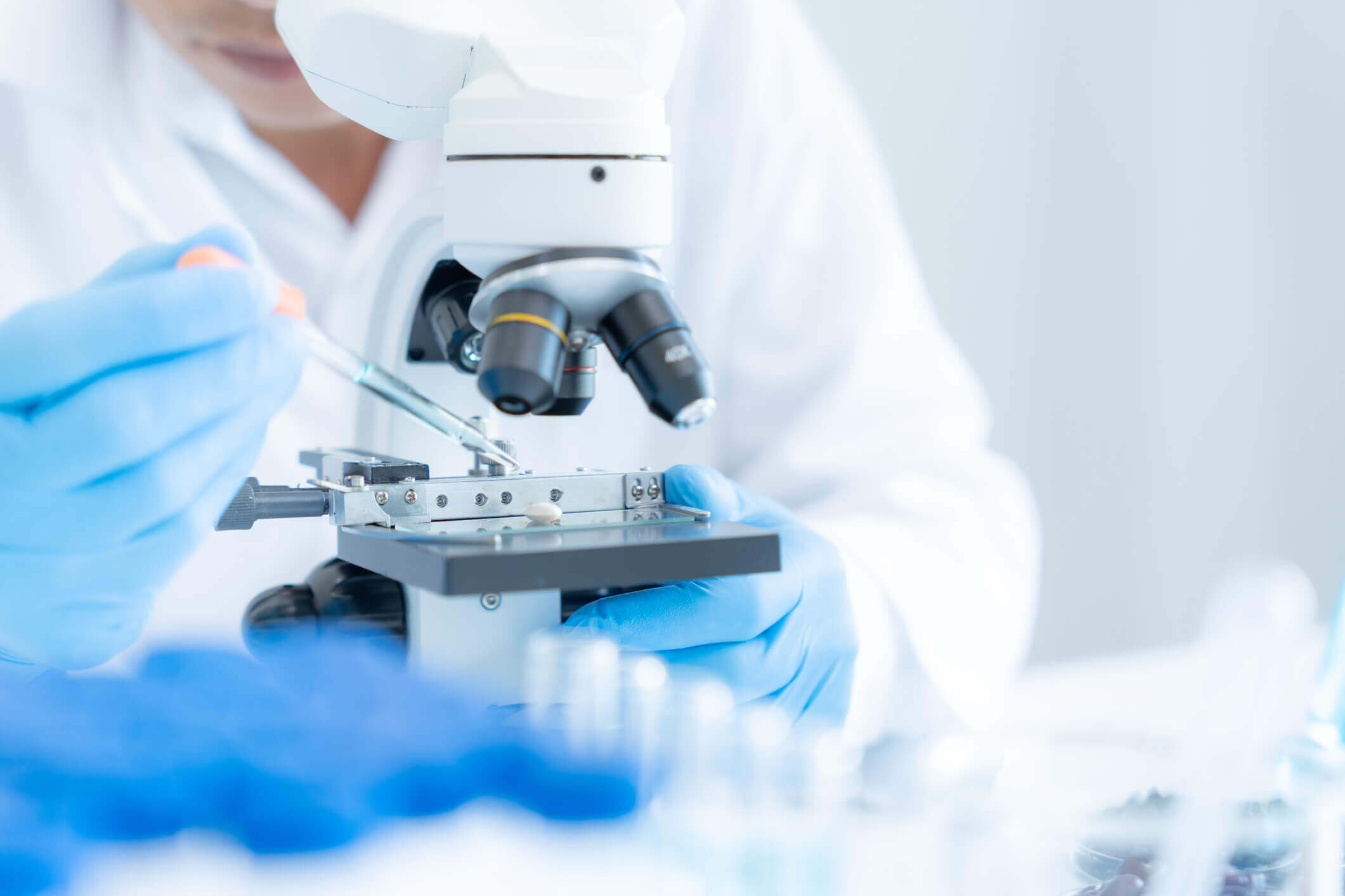 Scientist analyzing biochemical samples in advanced scientific laboratory
